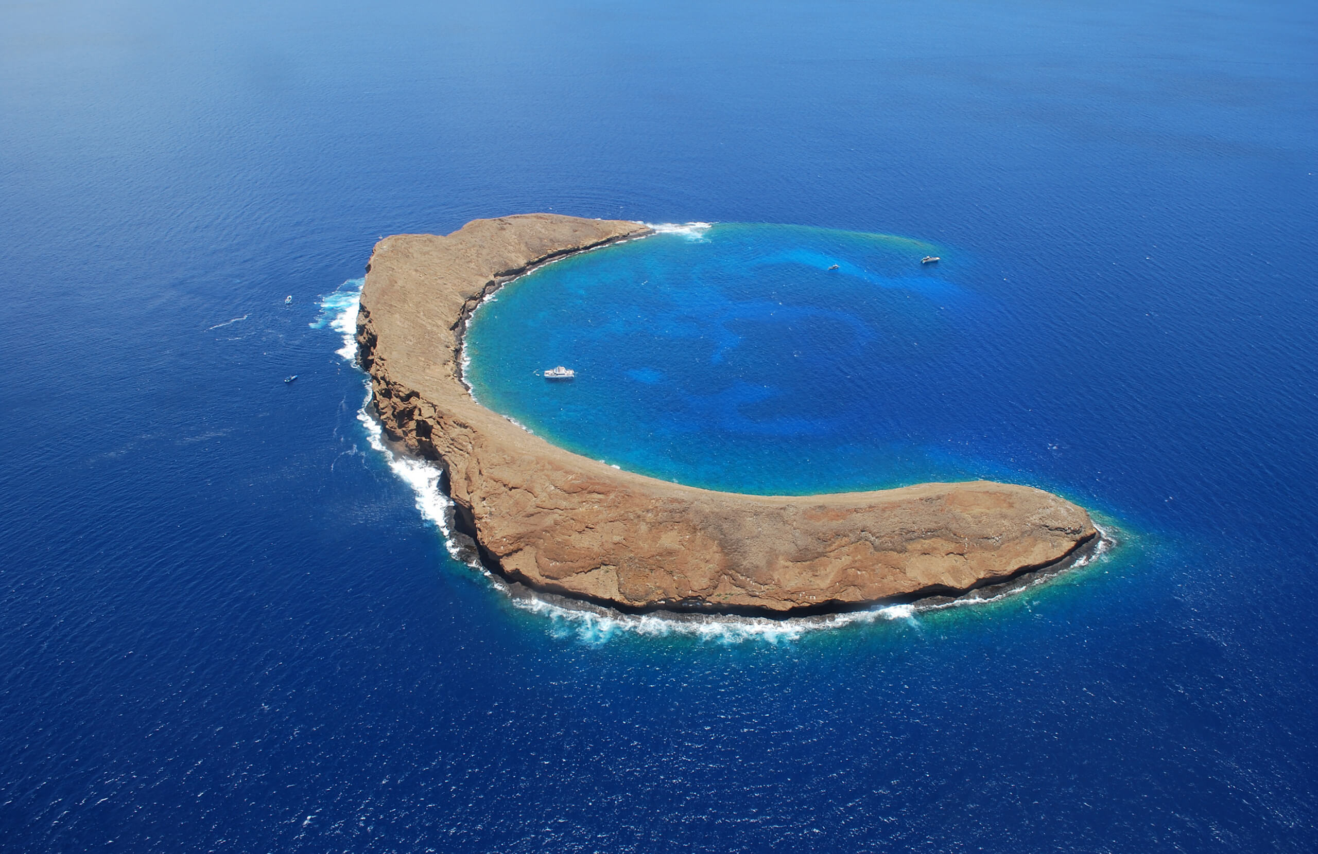 Aerial view of Molokini crater and surrounding ocean